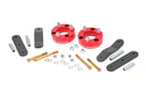 Rough Country 2.5 Inch Leveling Kit | Red Spacers | Nissan Frontier (05-26)/Xterra (05-15) view 1