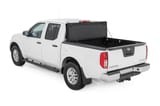 Hard Tri-Fold Flip Up Bed Cover | 5' Bed | Nissan Frontier 2WD/4WD (05-21) view 5
