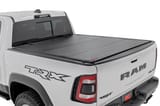 Hard Tri-Fold Flip Up Bed Cover | 6'4" | Ram 1500 (19-26)/1500 TRX (21-24) view 1