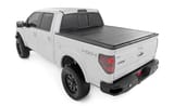 Hard Tri-Fold Flip Up Bed Cover | 5'7" Bed | Ford F-150 2WD/4WD (2004-2014) view 3
