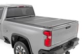 Hard Tri-Fold Flip Up Bed Cover | 6'9" Bed | Chevy/GMC Silverado/Sierra 2500HD/3500HD (20-26) view 1
