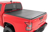 Hard Tri-Fold Flip Up Bed Cover | 5' Bed | Nissan Frontier 2WD/4WD (22-26) view 1