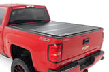 Hard Tri-Fold Flip Up Bed Cover | 6'7" Bed | Rail Cap | Chevy/GMC 1500/2500HD/3500HD (14-19) view 1
