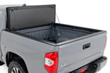 Hard Tri-Fold Flip Up Bed Cover | 5'7" Bed | Toyota Tundra 2WD/4WD (07-21) view 2