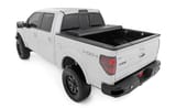 Hard Tri-Fold Flip Up Bed Cover | 5'7" Bed | Ford F-150 2WD/4WD (2004-2014) view 4