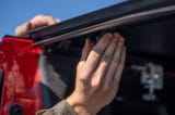 Hard Tri-Fold Flip Up Bed Cover | 5'10" Bed | Chevy/GMC Sierra 1500 (19-26)/Silverado 1500 (19-26) view 4