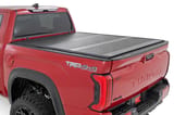 Hard Low Profile Bed Cover | 5'7" Bed | Cargo Mgmt | Toyota Tundra (22-26) view 1