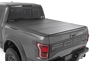 Rough Country Hard Tri-Fold Flip Up Bed Cover | 5'7" Bed | Ford F-150 (21-26)/F-150 Lightning (22-26)