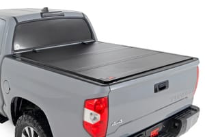 Tonneau Covers - Hard Tri-Fold Flip Up Bed Cover | 5'7" Bed | Toyota Tundra 2WD/4WD (07-21)
